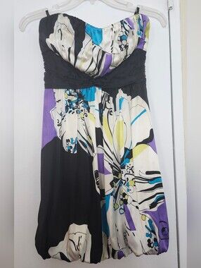 BEBE Strapless Floral Bubble-Hem Dress in Black, Cream & Purple.